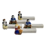 Five porcelain knife holders signed "Le Merzer", 6 cm