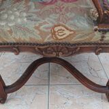 Paire de fauteuils Régence en noyer sculpté