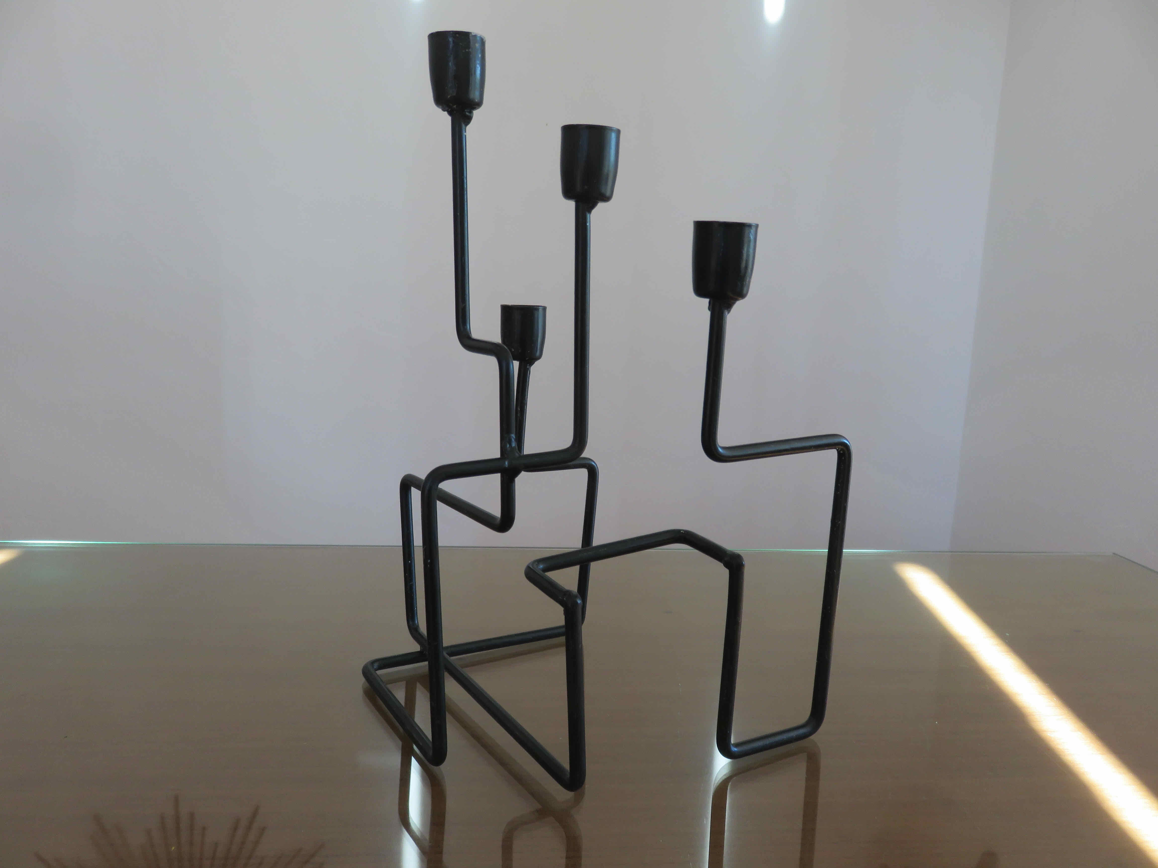 Modernist candle holder in black lacquered metal 1990