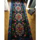 Romanian floral runner rug on blue background
