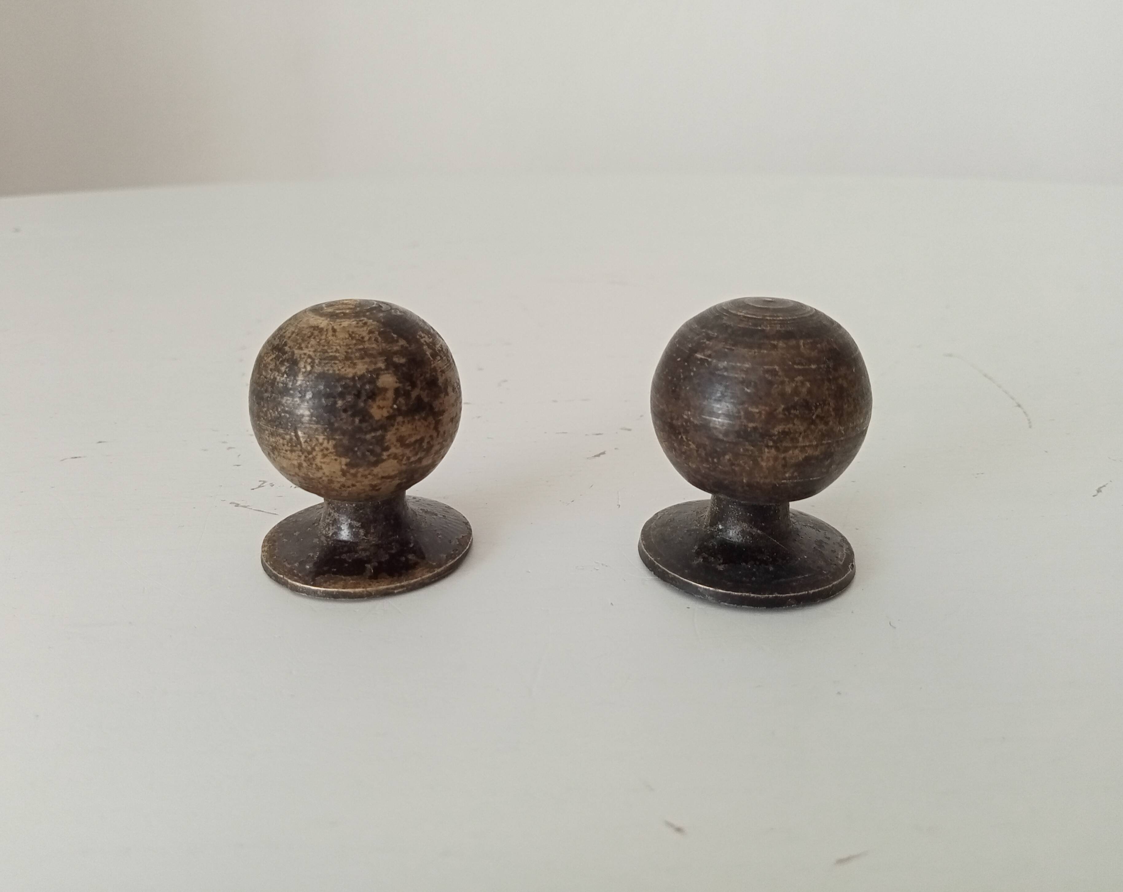 Pair of antique bronze furniture handles.