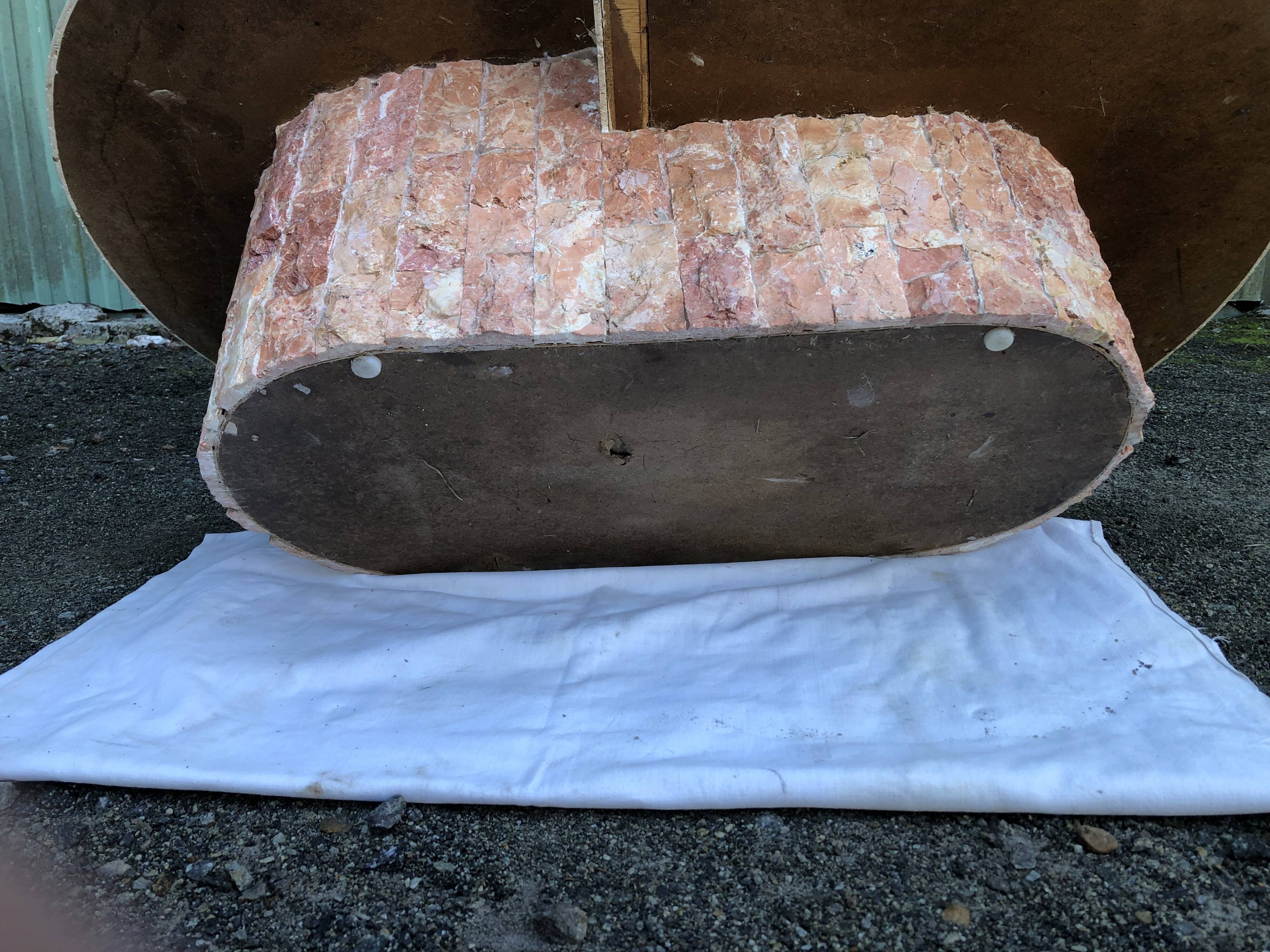 Vintage asymmetrical design coffee table in Mactan travertine stones by Magnussen ponte.