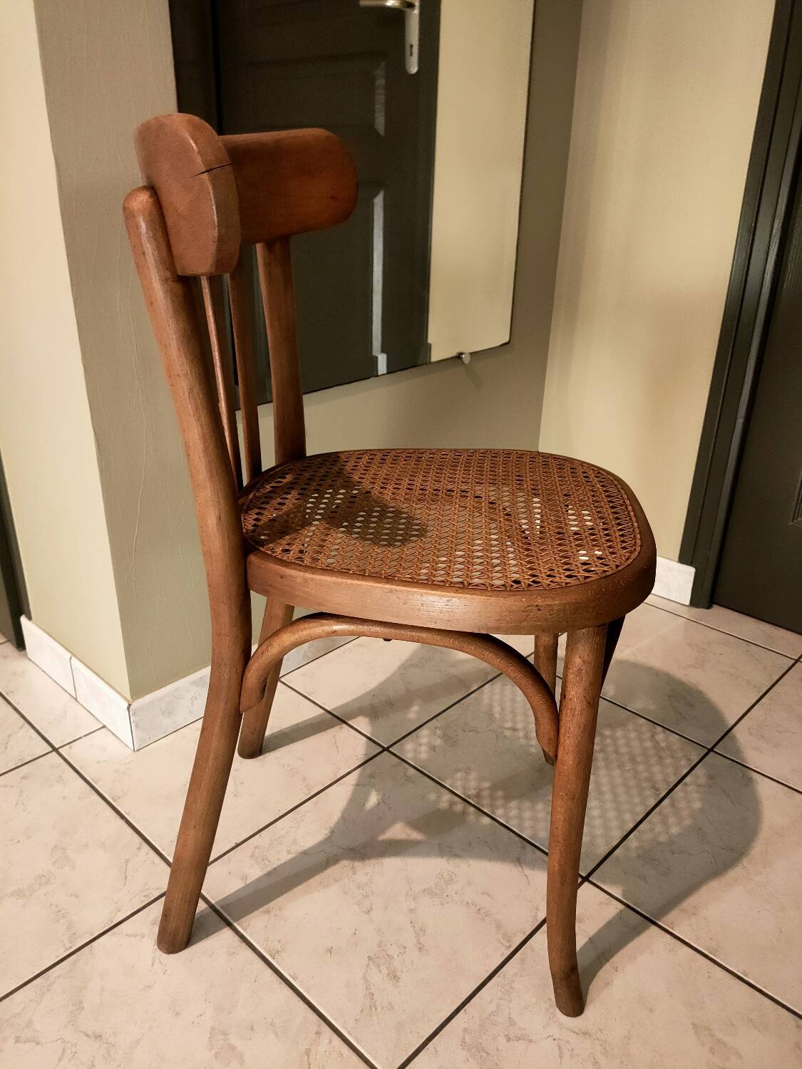 Old bistro chair with caned seat