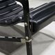Black leather chaise longue, Eileen Gray design, 1927, France, circa 1975.