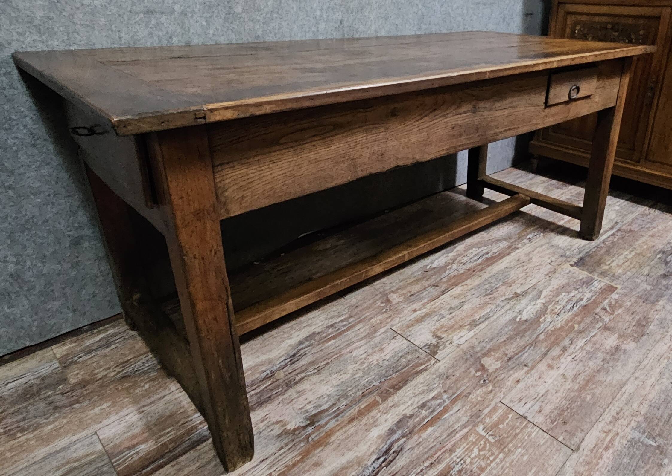 Large antique solid wood table from the Louis XIV period.