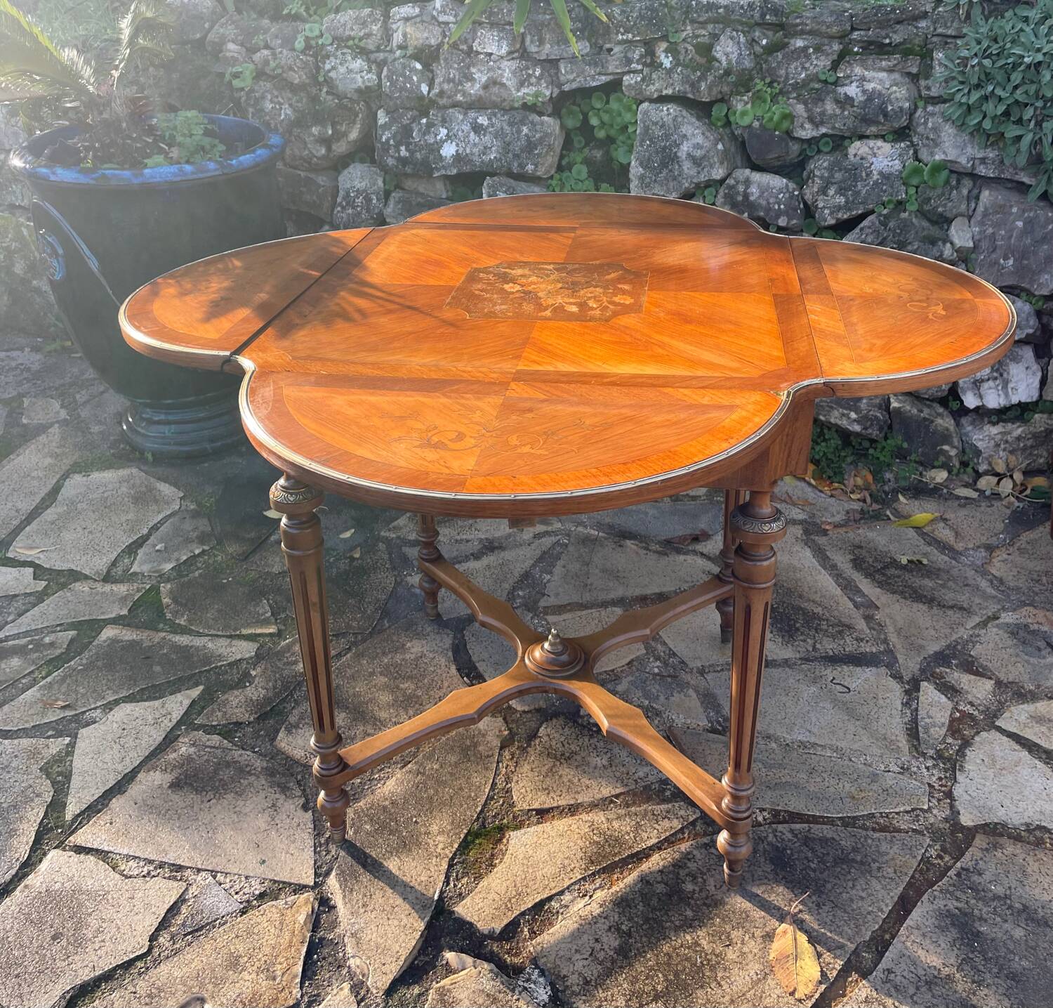 Center table decorated with marquetry of leaves and flowers in Louis XVI style, 19th century period