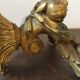 Golden wall candle holder