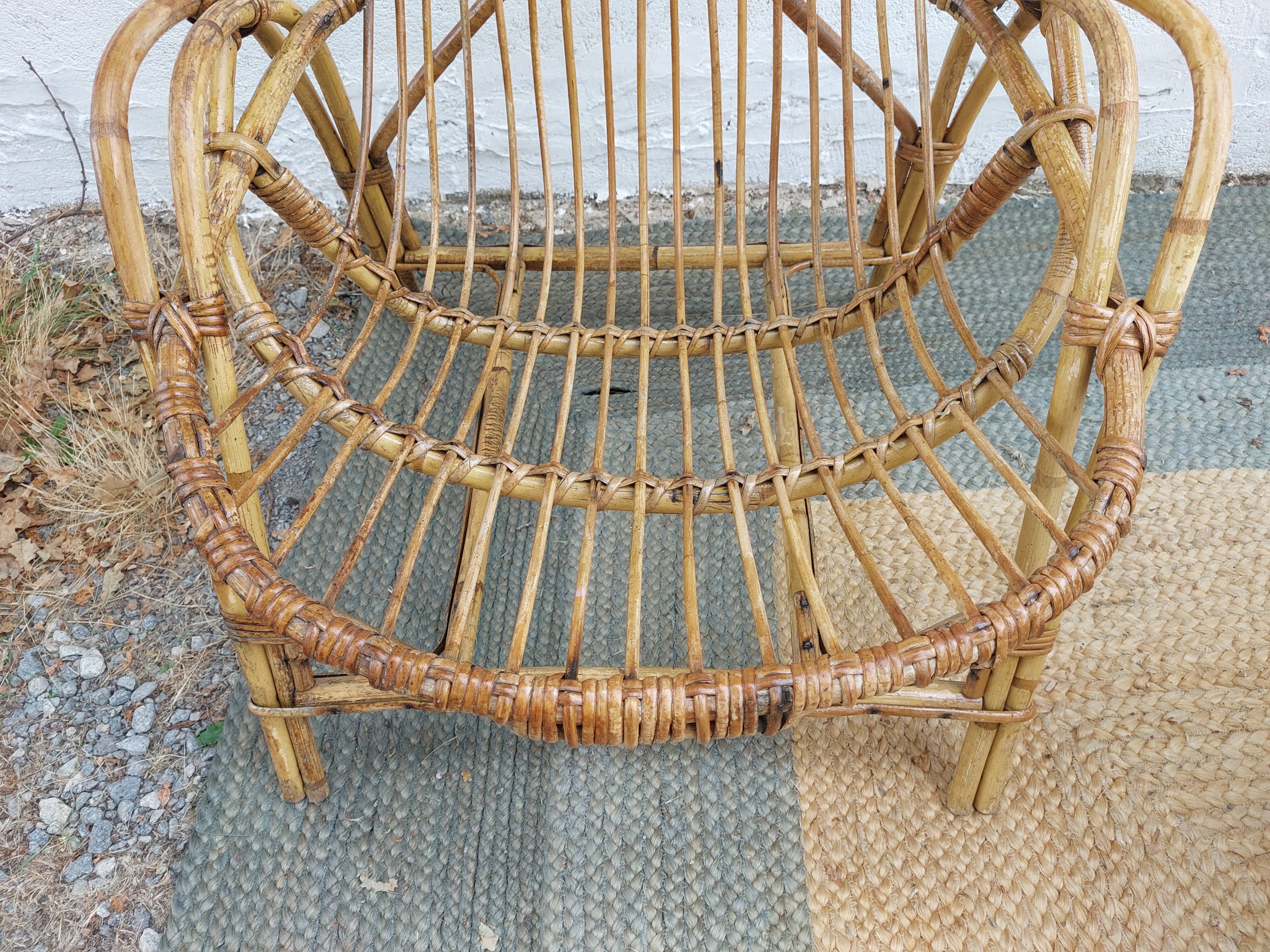 4 armchairs and a coffee table made of rattan and bamboo wood, vintage.