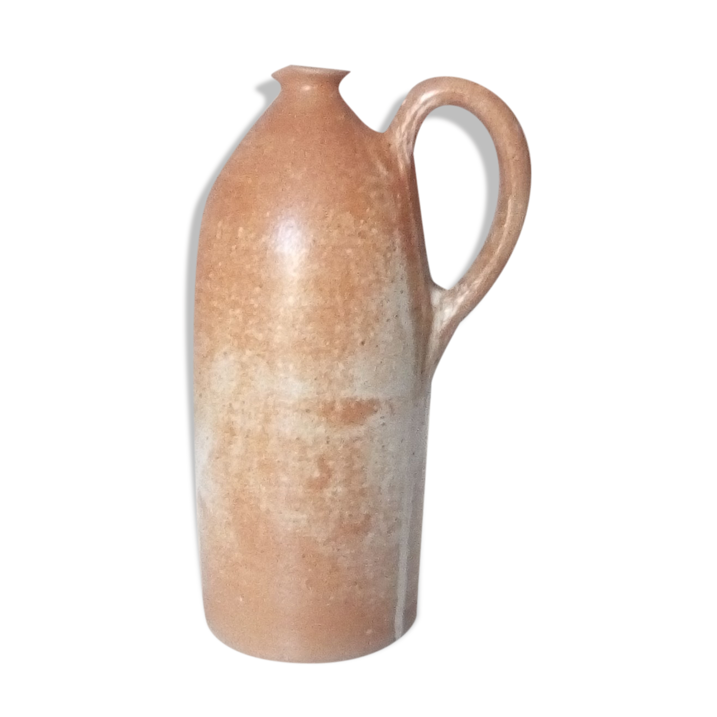 Vintage pitcher jug in sandstone
