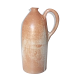 Vintage pitcher jug in sandstone