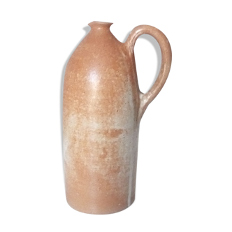 Vintage pitcher jug in sandstone