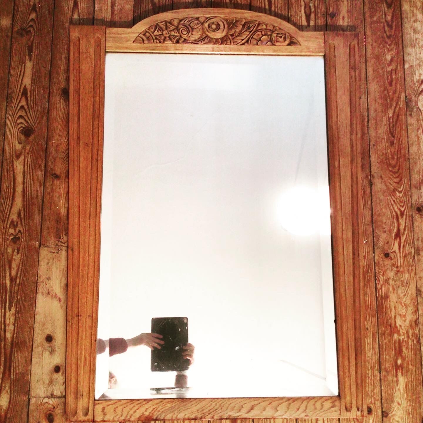 Beveled fireplace mirror