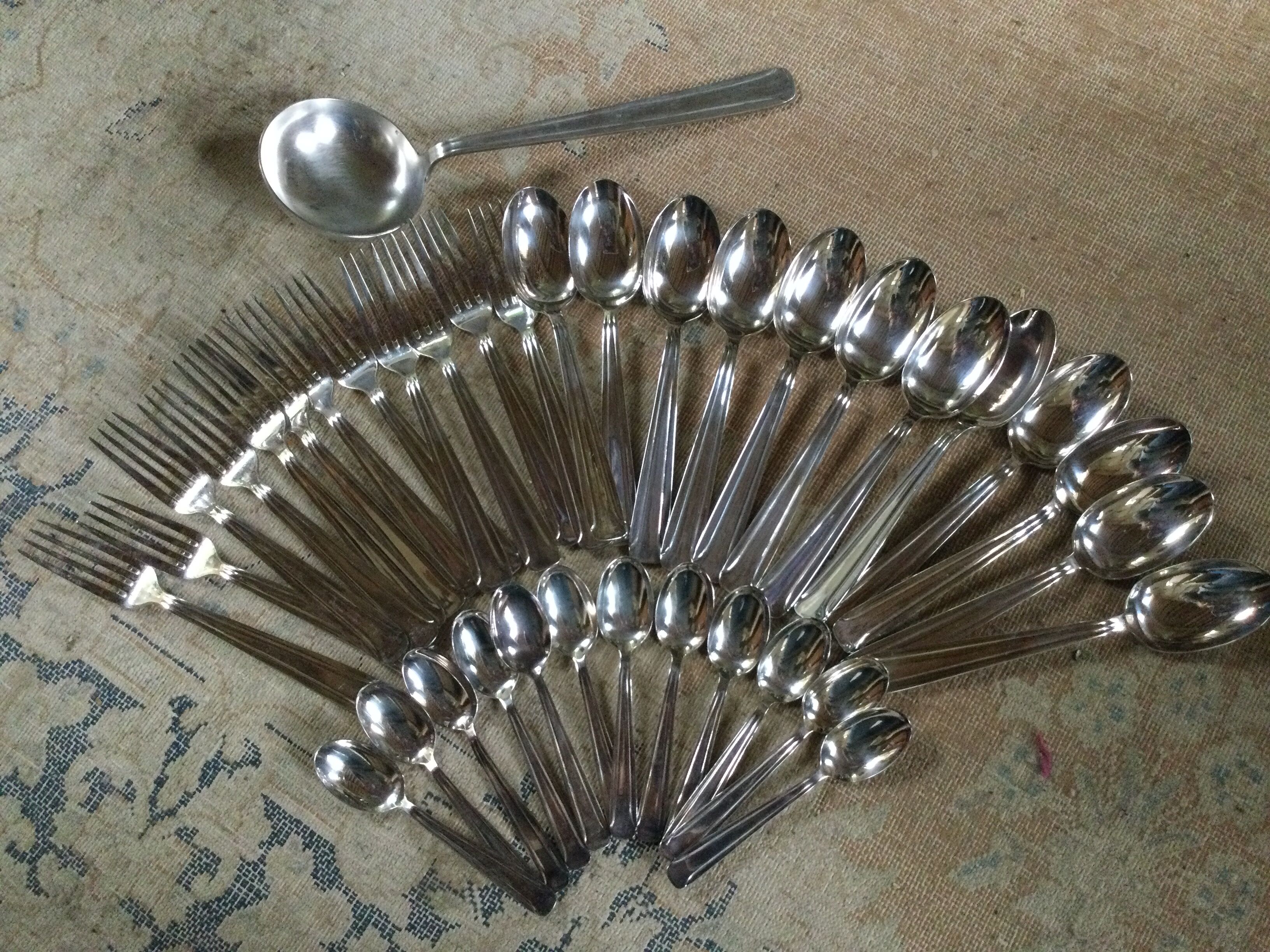 Old housewife in silver metal