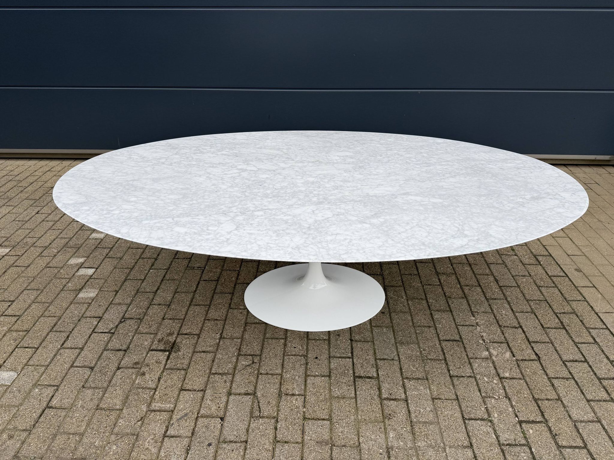 Original Knoll Tulip oval dining table (244cm) in Carrara marble.