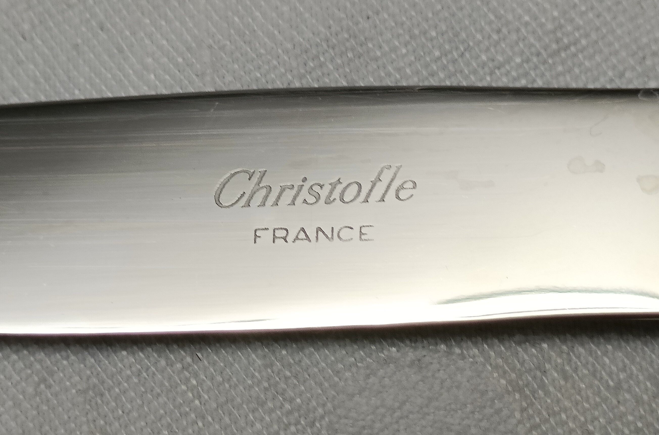 set of 12 silver metal dessert knives from Christofle model "spartours"