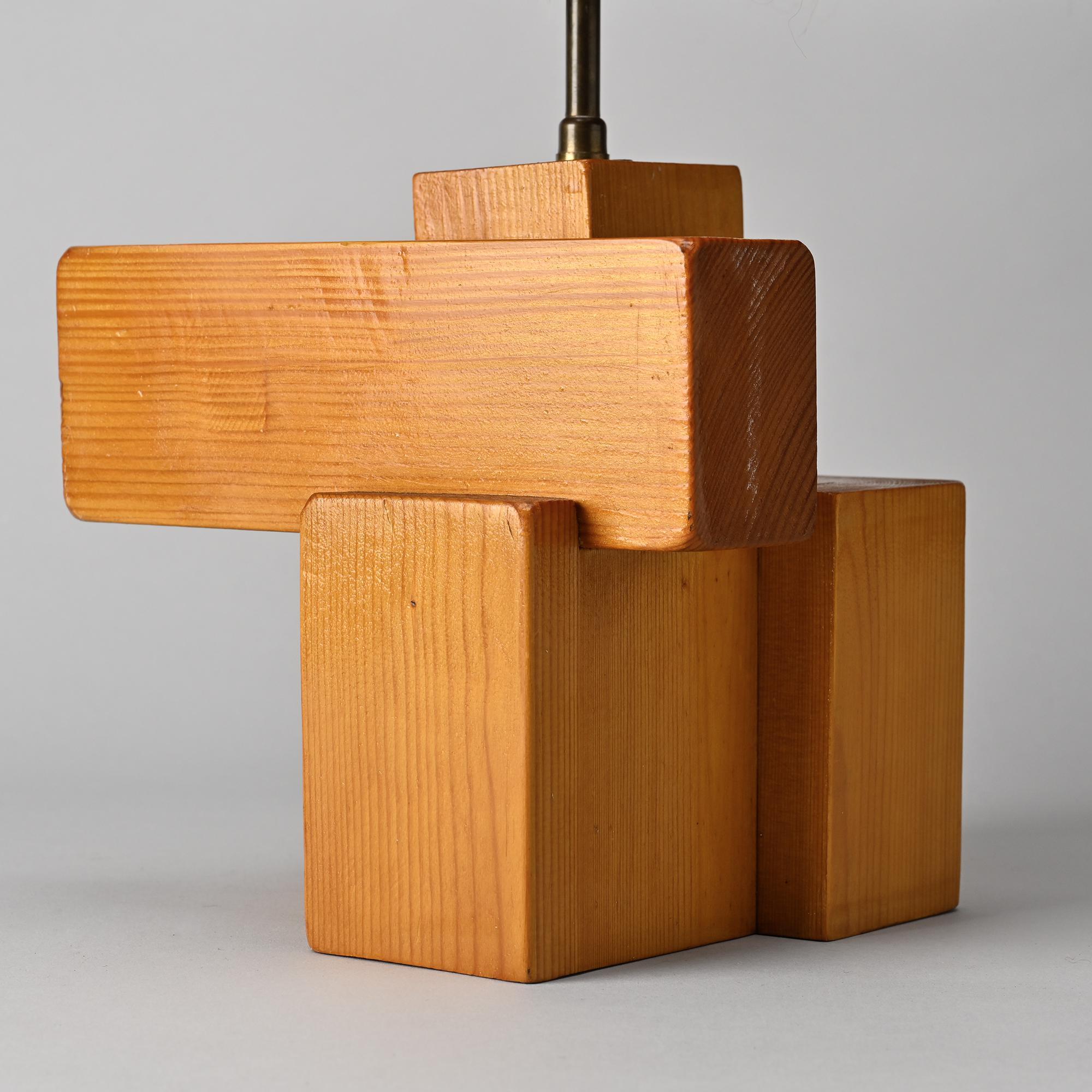Sculptural table lamp in solid pine, France, circa 1970.