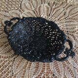 Fruit basket or bread in metal worked lace effect. Black color