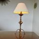 Large "Arts & Crafts" style lamp in beaten iron with a golden patina.