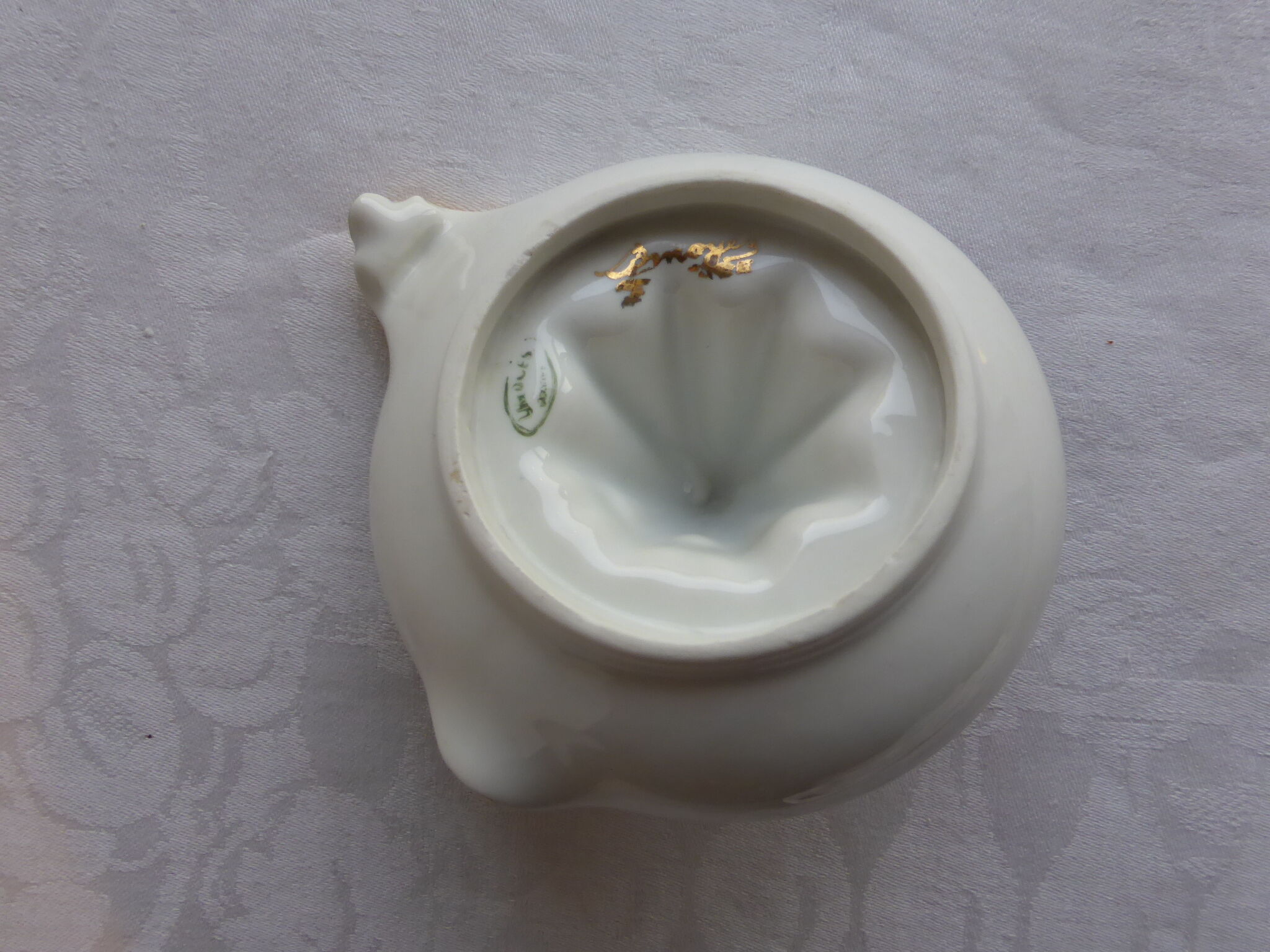 Presse-citron ancien en porcelaine de Limoges blanc et doré