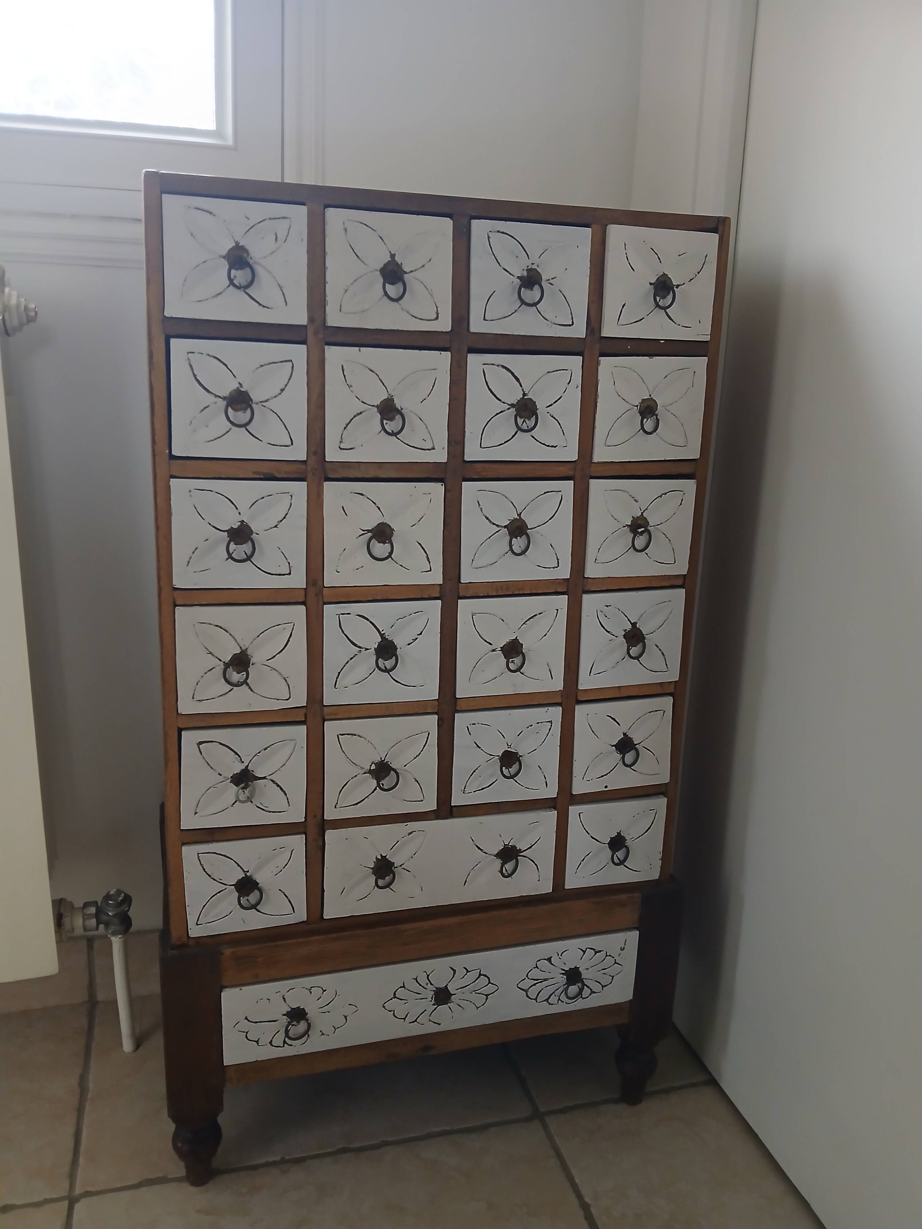 Indonesian-style drawer cabinet.