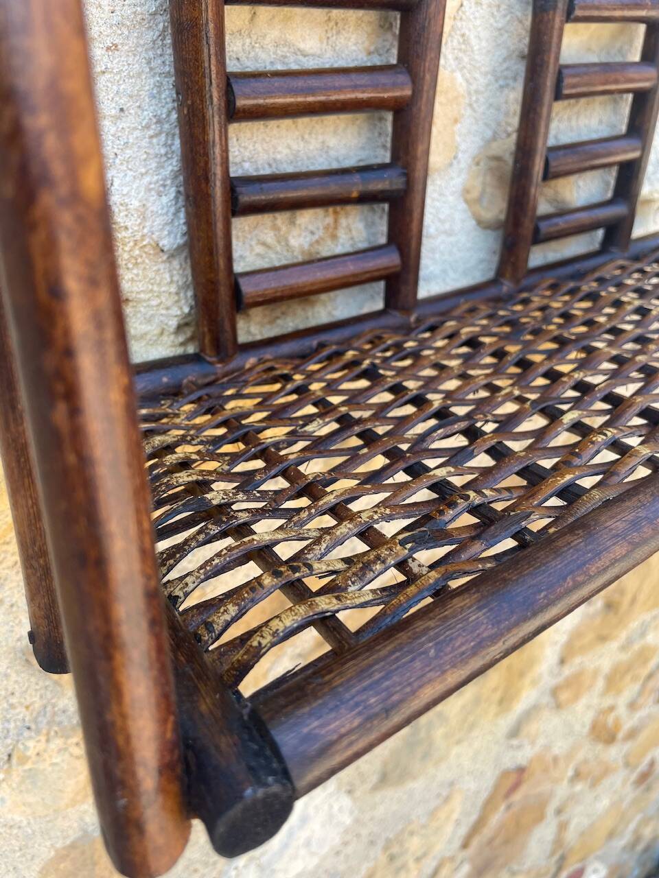 Vintage wall shelf in bamboo and rattan, circa 1960s.