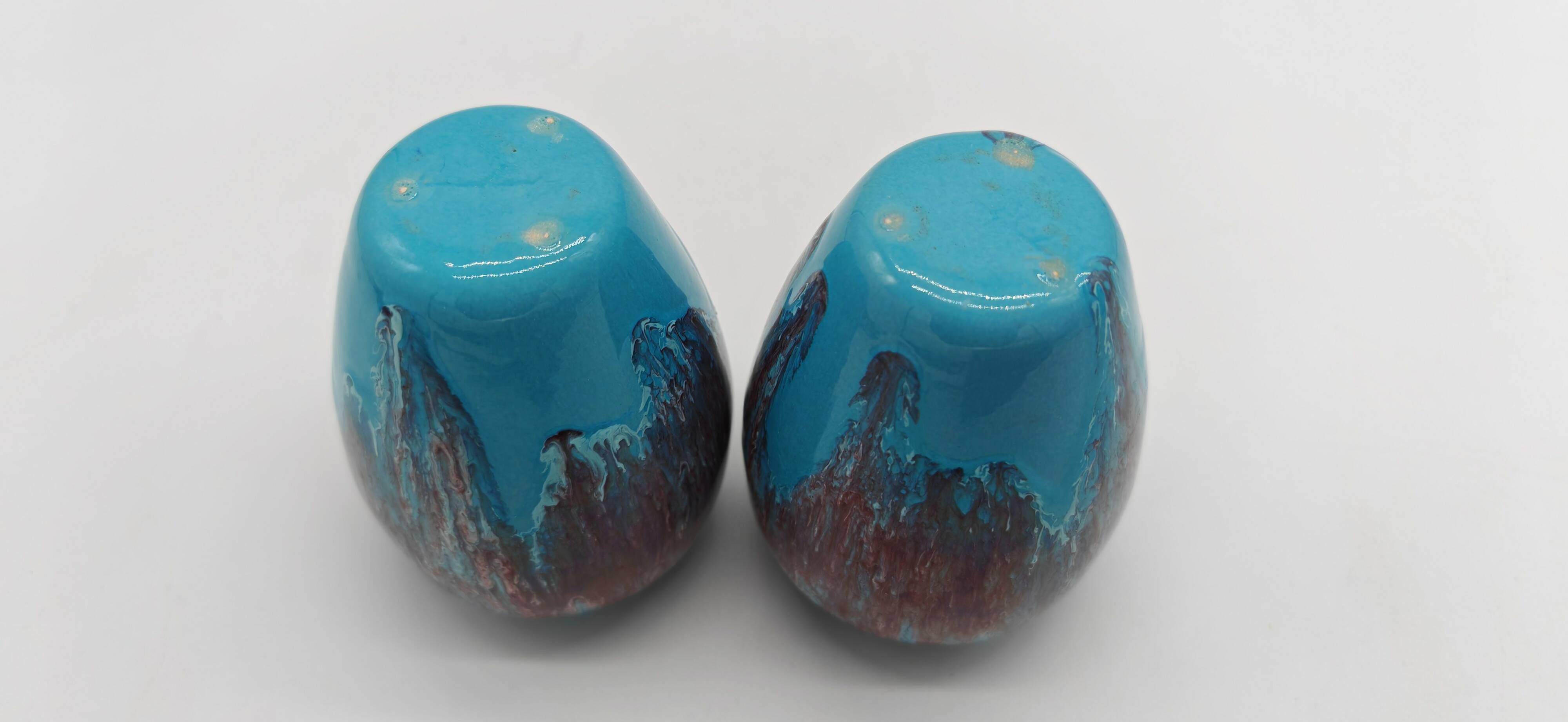 Pair of small turquoise blue vases in flamed stoneware with wine