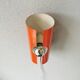 Raak Amsterdam orange wall applique from the 1970s
