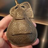 Empty pocket pear in solid brass or bronze