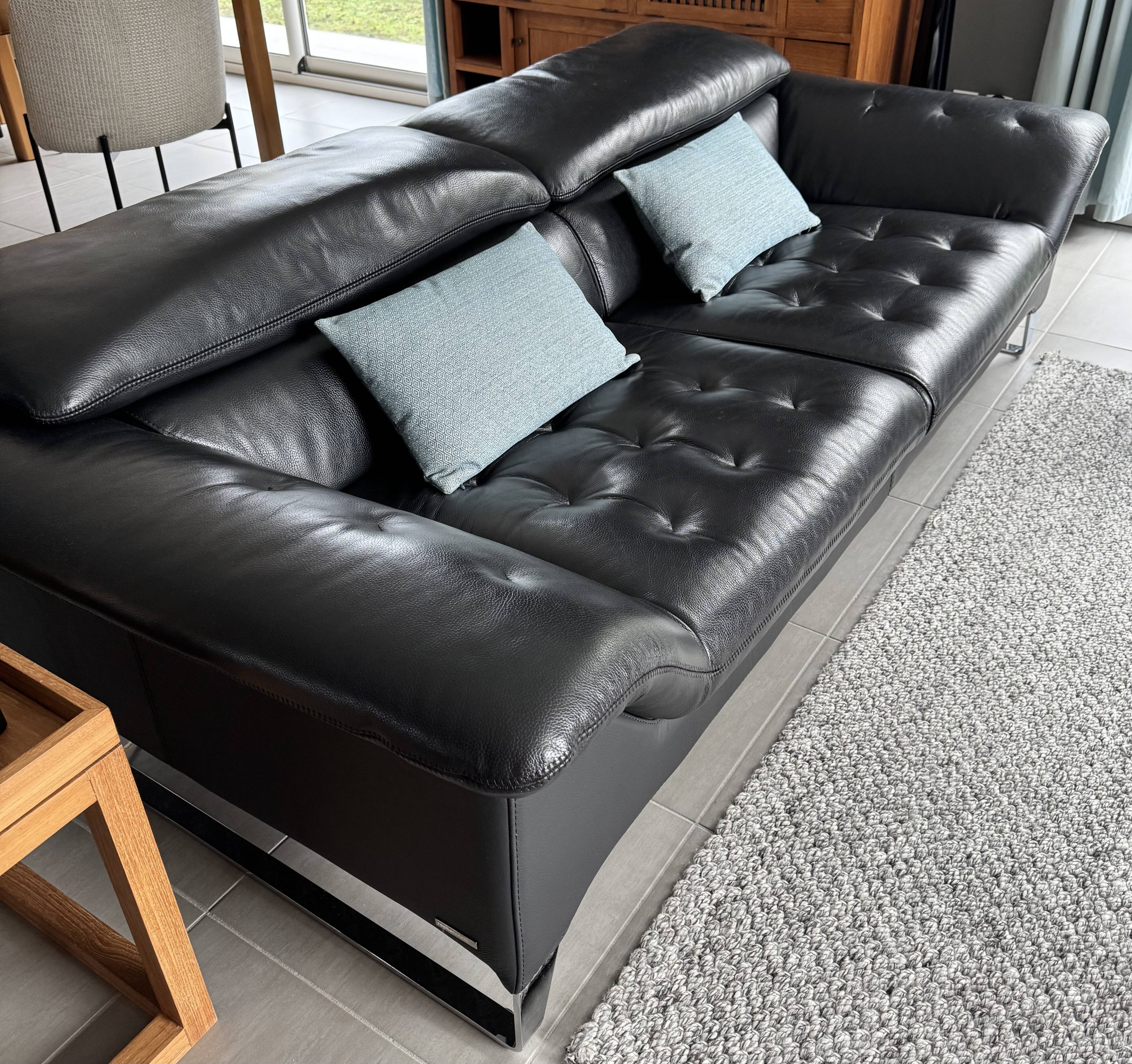 Two-seater black leather sofa Roche Bobois