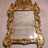 Gilded wooden mirror with parecloses, Louis XV period, circa 1750, 58x120cm