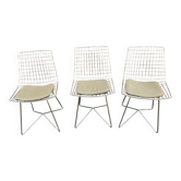 Three chairs in the style of Harry Bertoia