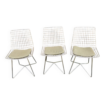 Three chairs in the style of Harry Bertoia