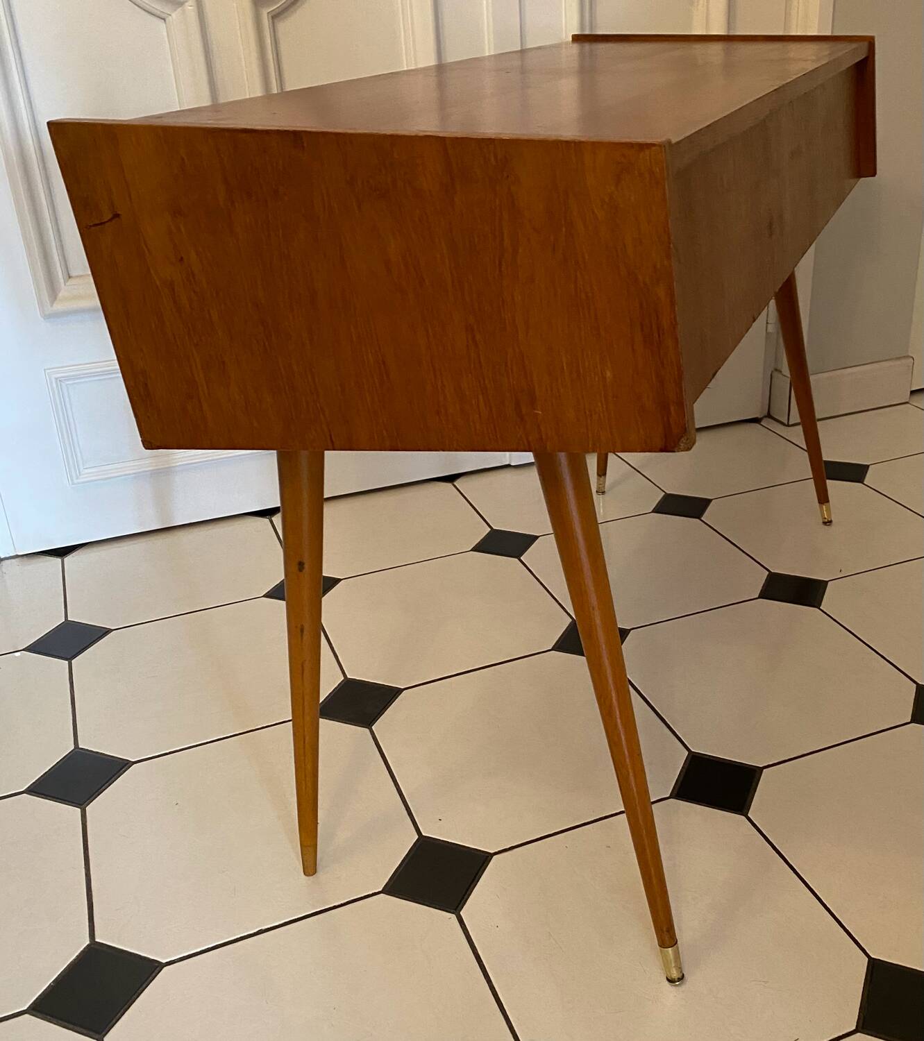 Vintage console with compass feet