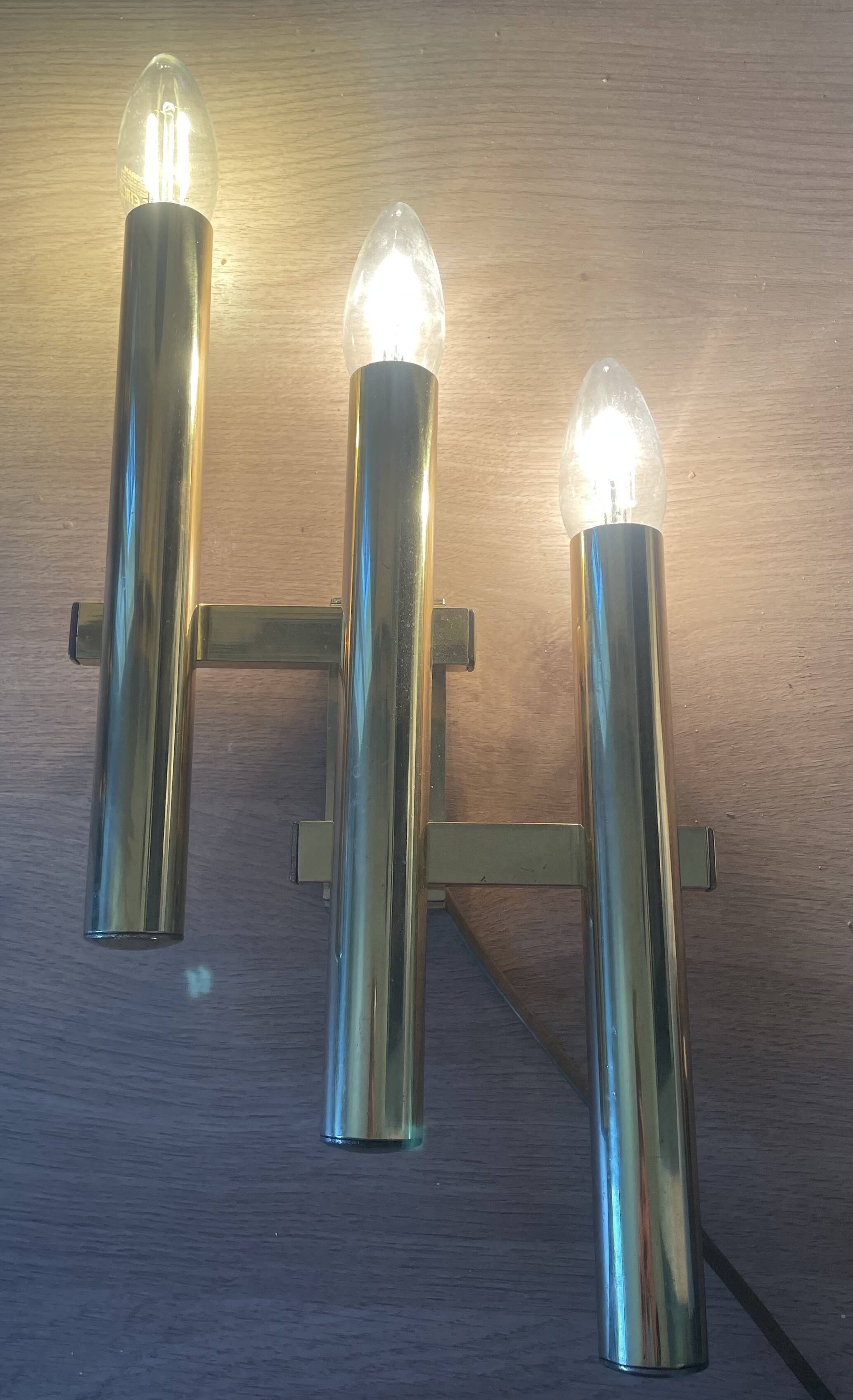 Tubular wall sconces in brass, Italian design from the 70s, attributed to