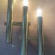 Tubular wall sconces in brass, Italian design from the 70s, attributed to