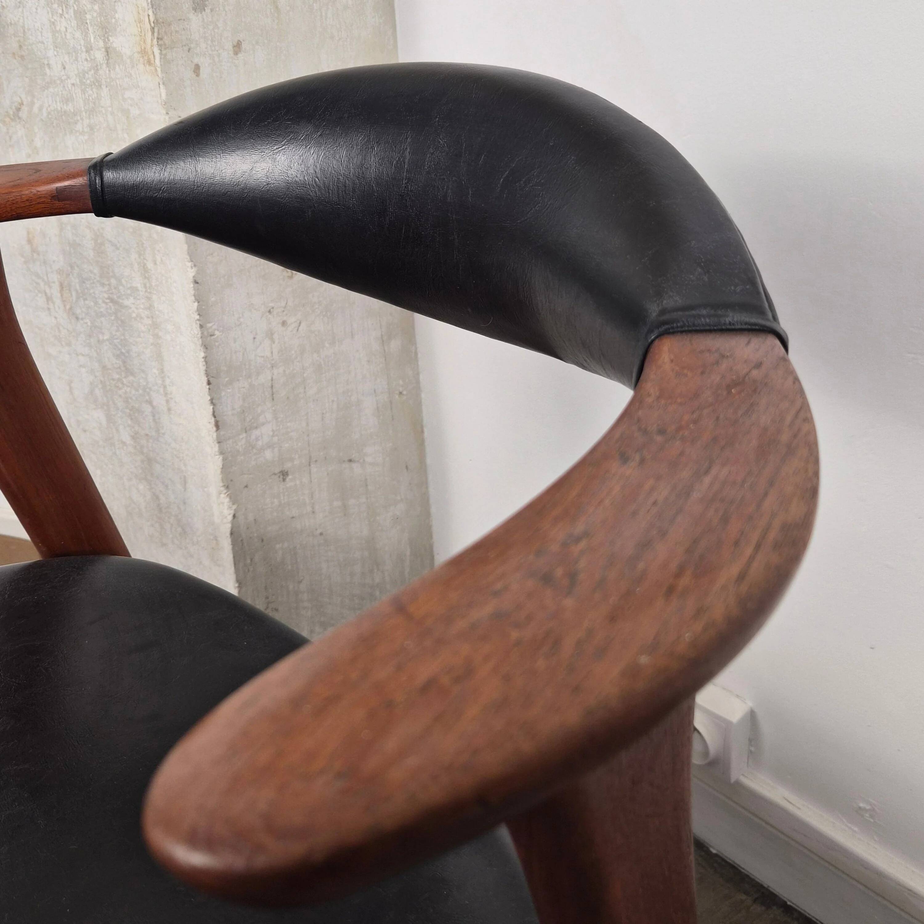 Teak chair with faux leather, model 49 by Erik Kirkegaard for Høng Møbelfabrik, Denmark, 1960.