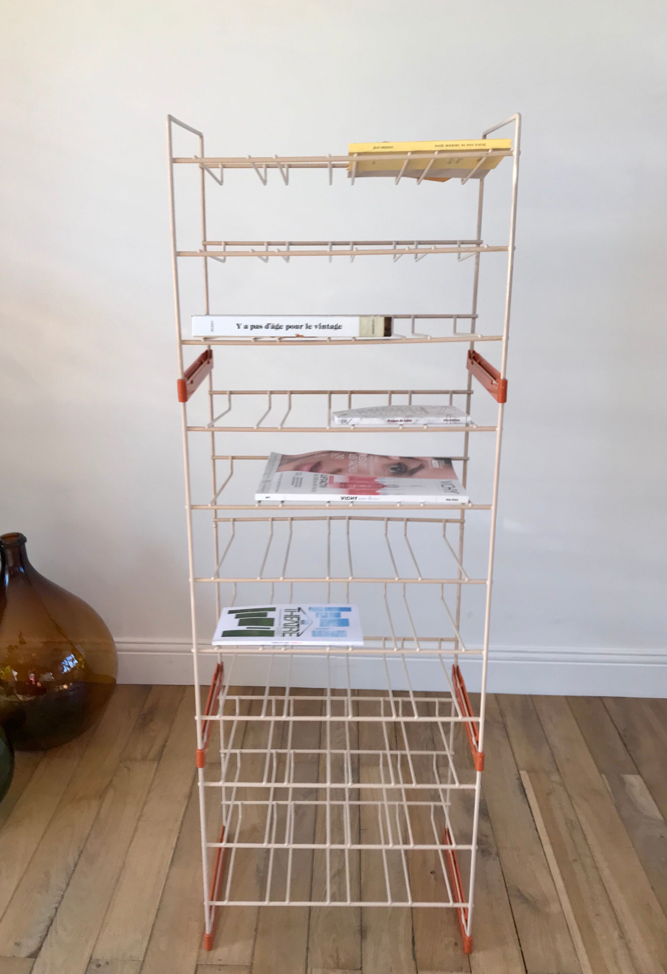 White and orange industrial shelf brand "caddie" 50s