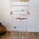 White and orange industrial shelf brand "caddie" 50s