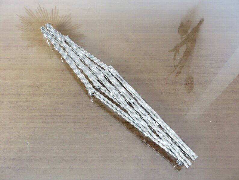 Extendable silver metal underside 40s 50s