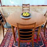 Expandable teak dining table, butterfly extension, circa 60s