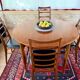 Expandable teak dining table, butterfly extension, circa 60s
