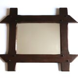 Rectangular mirror with bevelled wooden frame, 1970s.