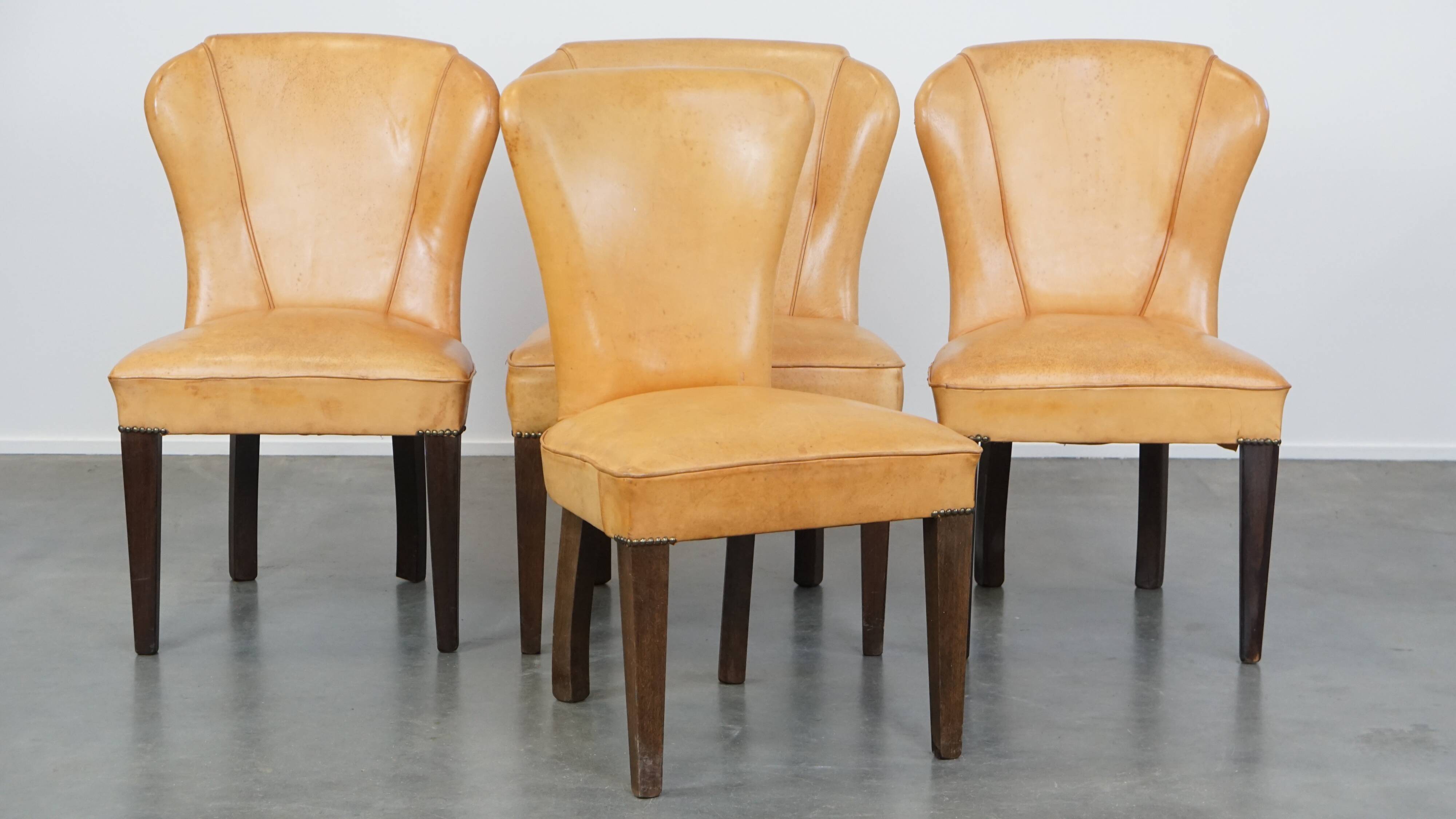 Set of 4 comfortable honey-colored goat leather dining chairs
