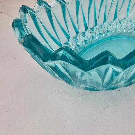 Vintage blue-green turquoise plate in cut and relief glass.