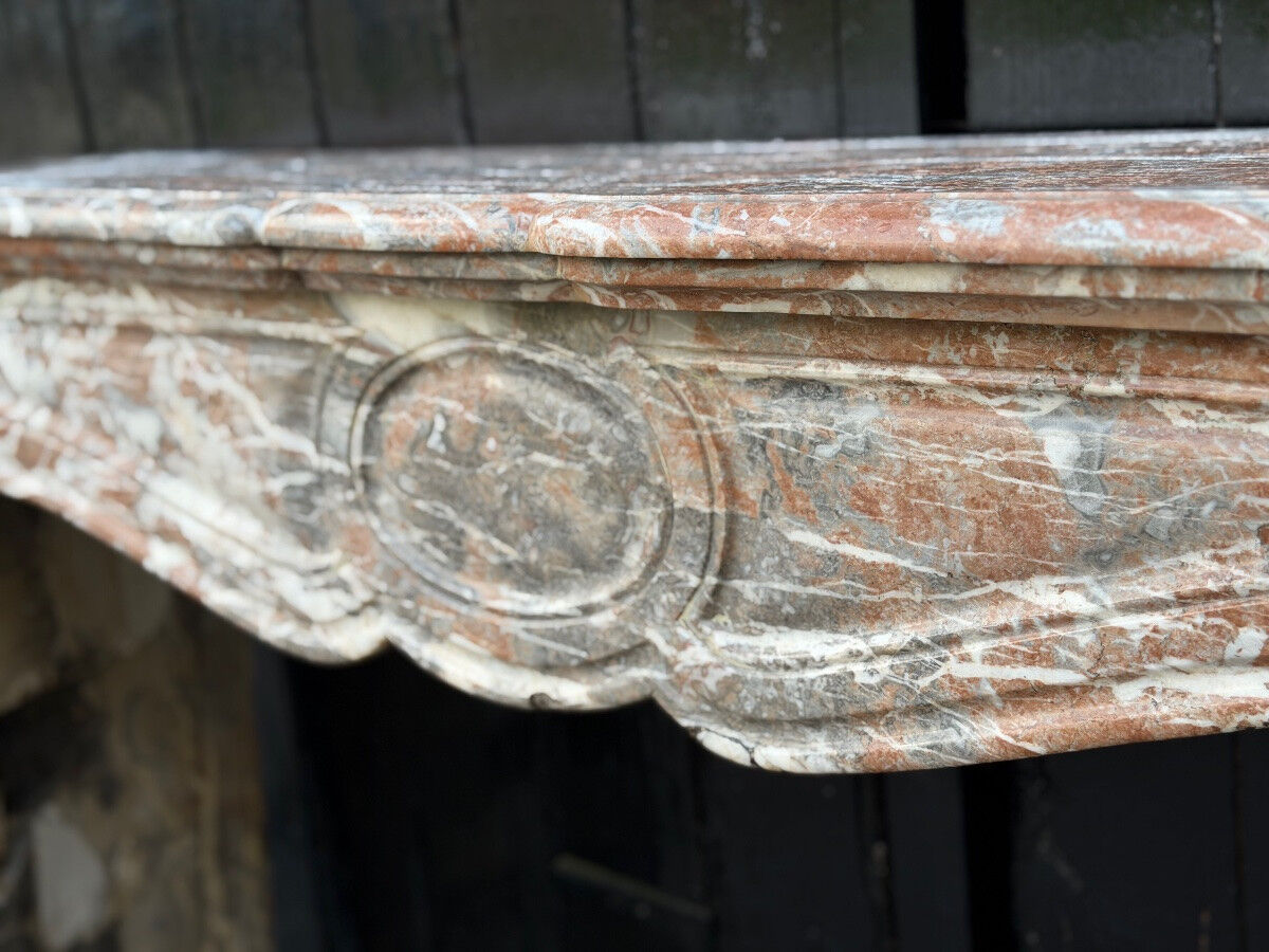 Louis XV style fireplace in grey Ardennes marble, circa 1900.