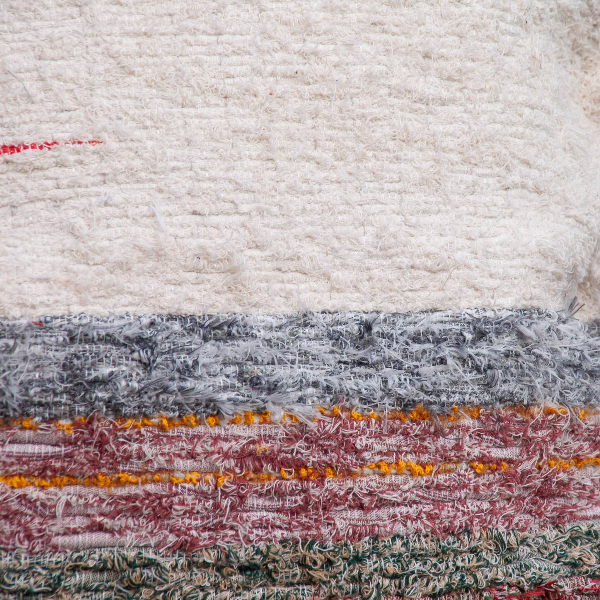 Hand-woven handmade cushion cover made from recycled cotton