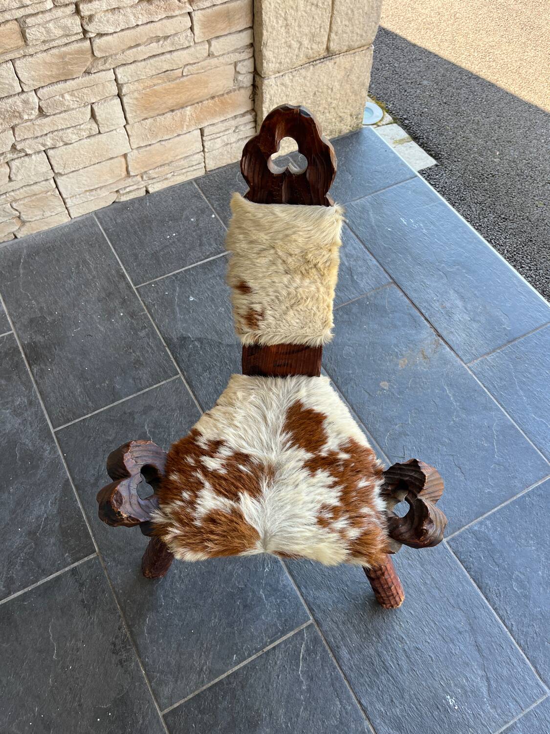 Vintage brutalist tripod chair in wood and leather