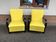 Pair of yellow Art Deco armchairs in cotton and wood, black frame, 1920s.