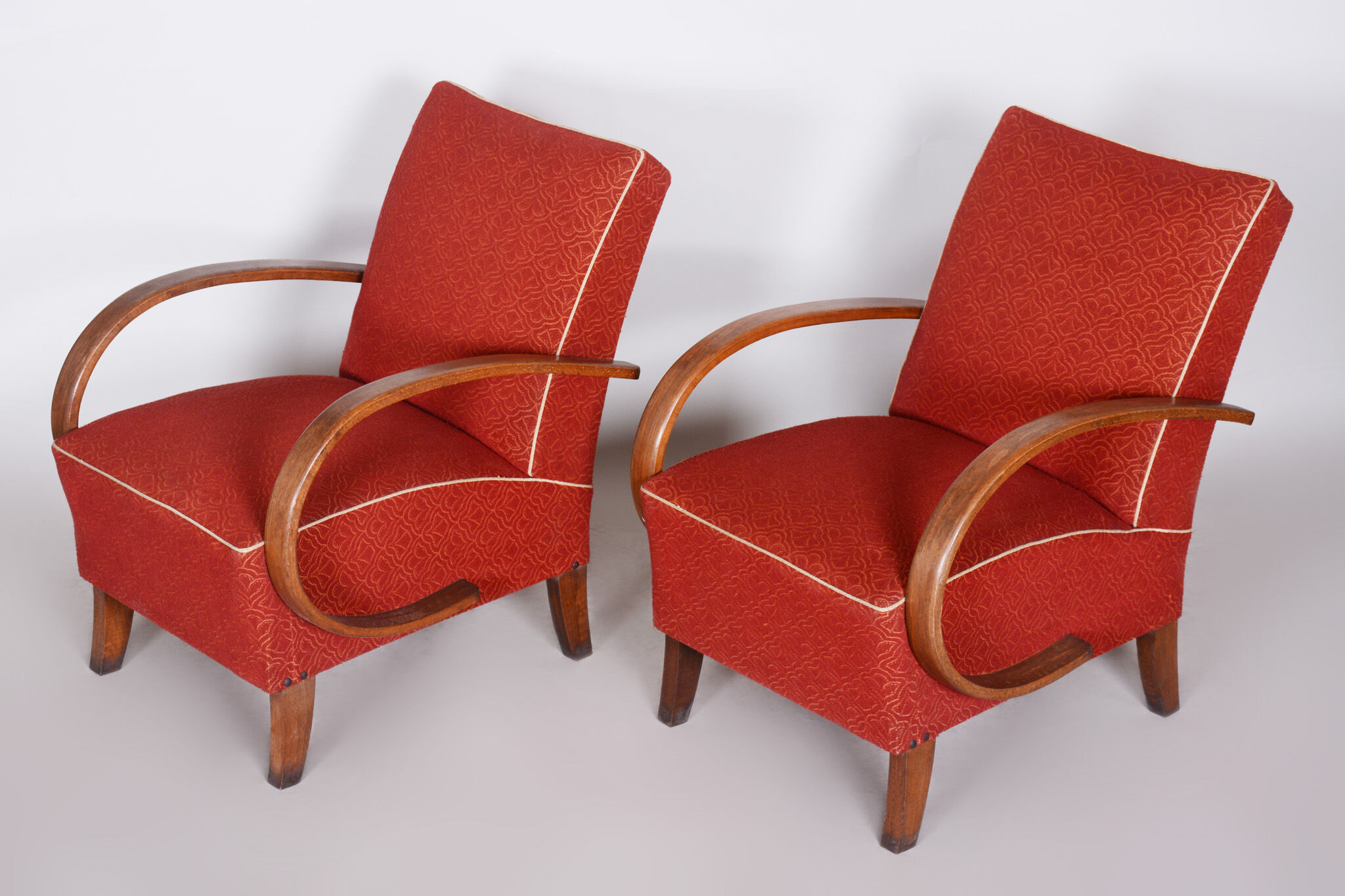 Pair of red Art Deco armchairs made in the 1930