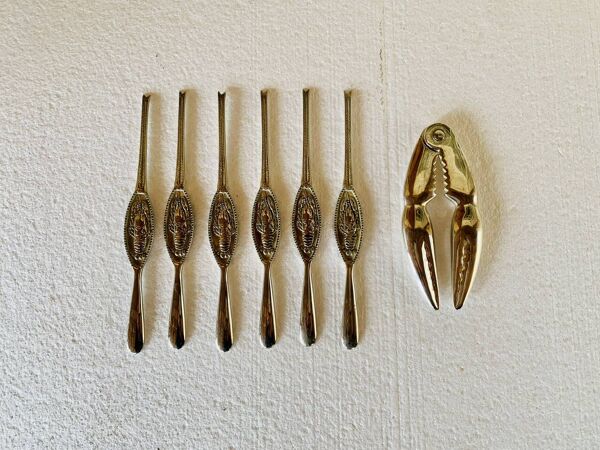 Ensemble 6 fourchettes et pince a Homard, metal argenté Par Silea, circa 70